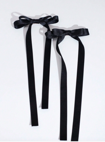 Tyylikkäät mustat rusettihiusklipsit tytöille