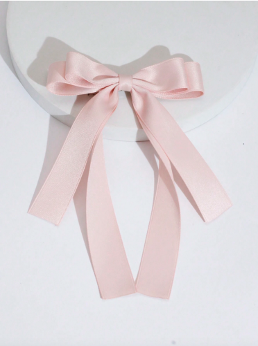 Vaaleanpunainen satiinirusetti tytöille